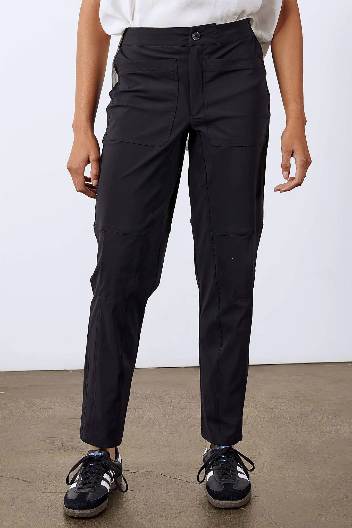 Black tapered trousers, front view