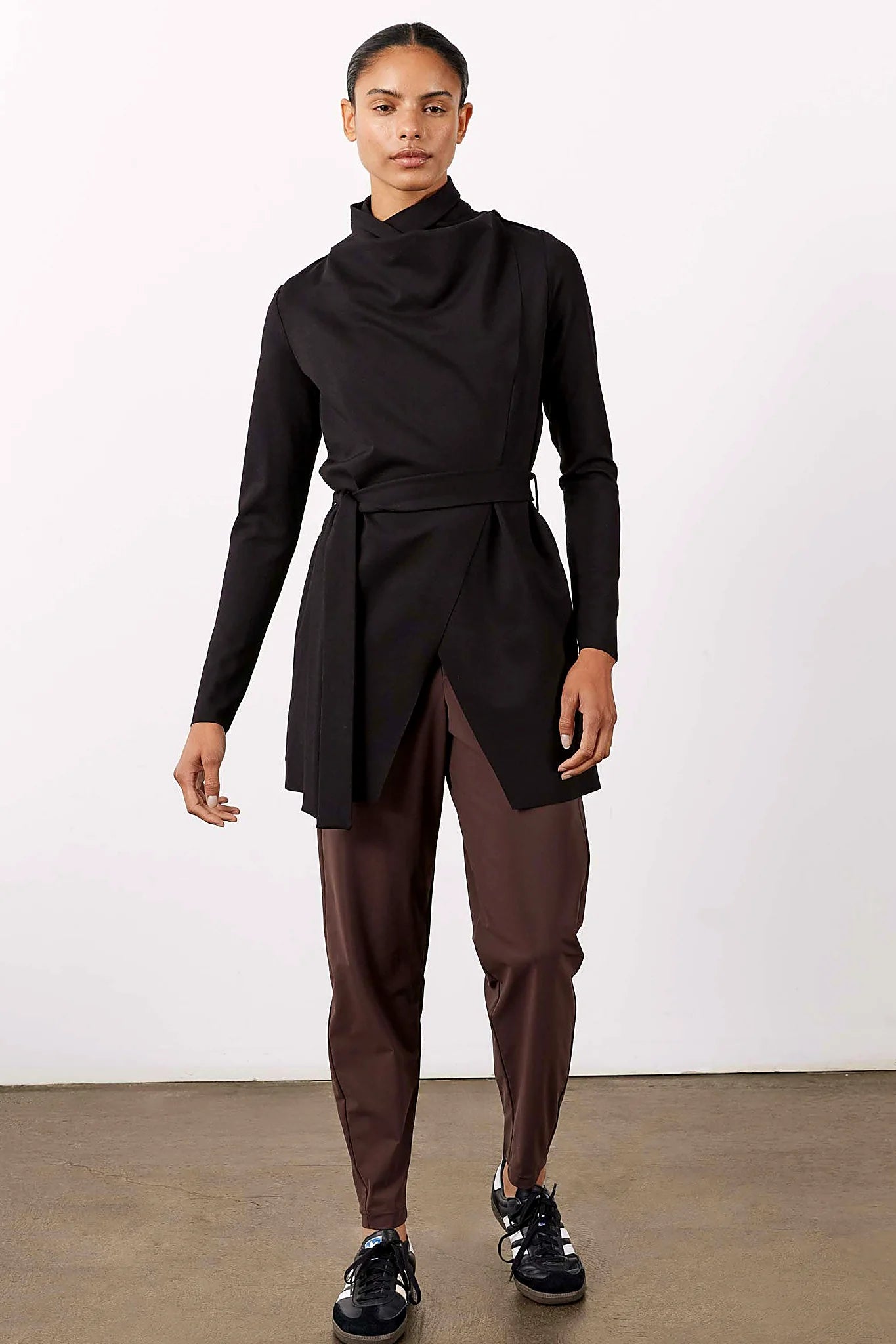 The long, soft line of the jacket from the side