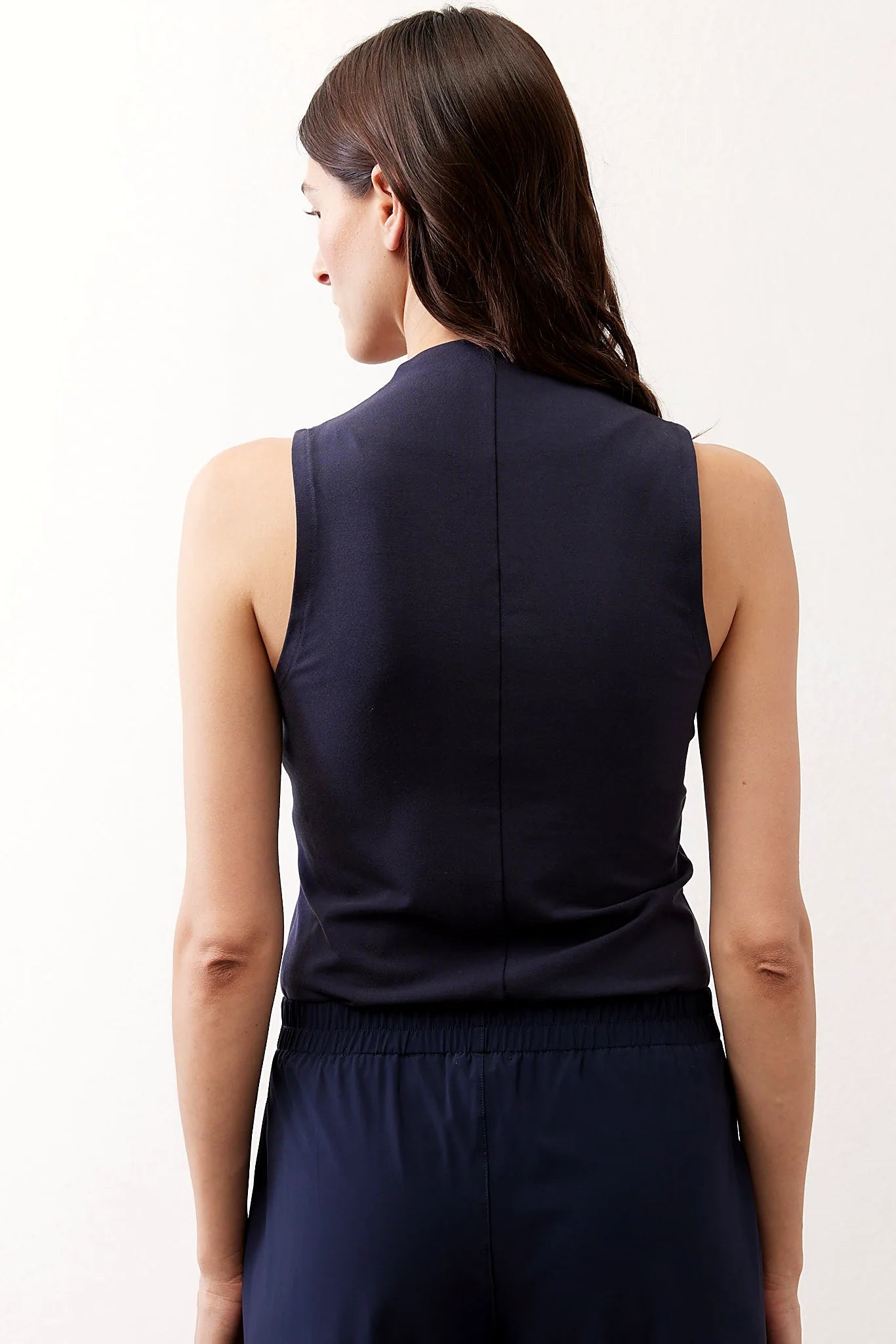 Side view showing the close, tailored fit